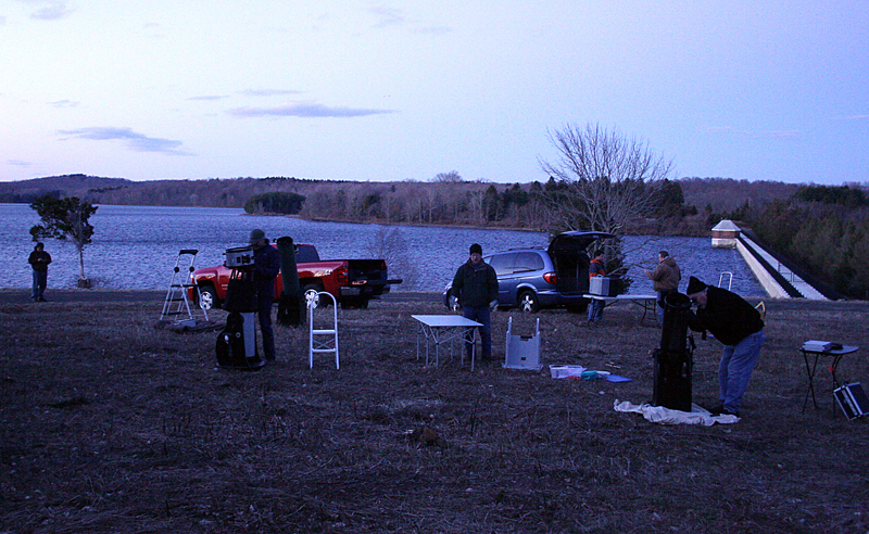 As the sky darkens, ASNH members set up their telescopes at Lake Gaillard.