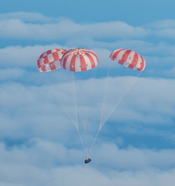 Three Main Parachutes Slowing Descent of Crew Module.  Images courtesy of NASA.