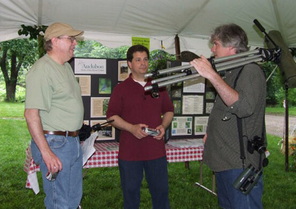 Photos taken by Eleanor Andujar
May 2006 - ASNH members (LTR) Dennis Kocyla, and Greg Barker, talk with one of Audubon members. This was at a recent public outing of the Audubon Society in Southbury, Ct. at Bent of the River. Even though rain eliminated the Solar viewing for the day, a great day was had by all attending the many live animal demonstrations that were held under a large tent. 

