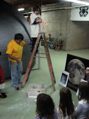 Photos by Al Washburn
C.J. making meteor craters with Al Washburn.
