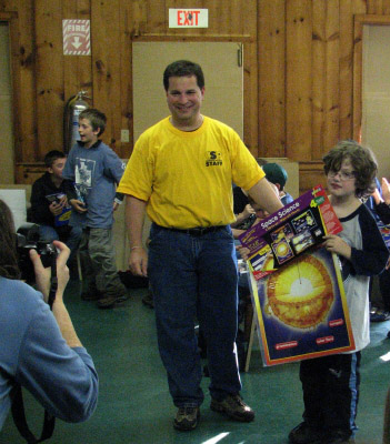 Photo by Walt Kupson
C.J. Winning a space poster.
