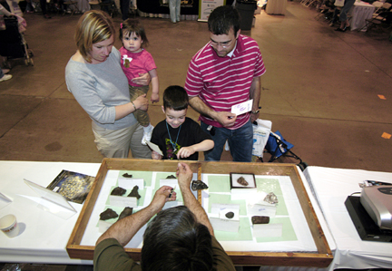 Photo by Alan Chaniewski - CPTV Family Science Expo, April 27-30, 2006
CPTV's Family Science Expo is an annual evnt that draws thousands of parents, teachers, and students from around the state that has innovative programs that encourage the understanding of science applications in our everyday lives and how science affects the future. ASNH shares a booth with other astronomical clubs to put on demonstrations and information to all participants.



