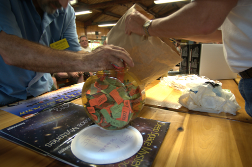 Photo by Alan Chaniewski
Mixing up the full raffle bowl.
