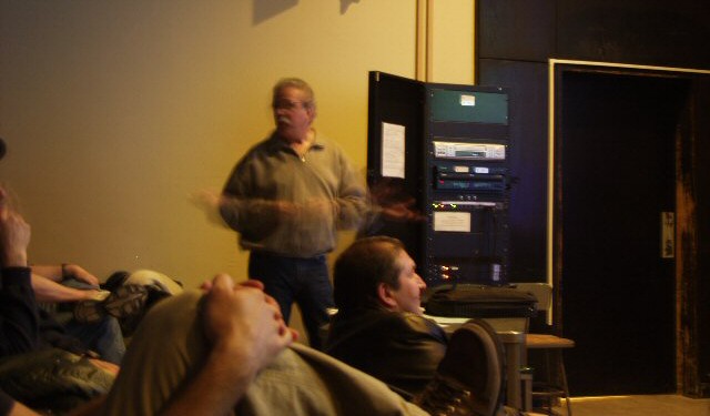 Photos by Greg Barker - Paul Hyndman's Lecture on Digital Astro-imaging April 2006
Paul demonstrates with his hands
how fast digital Digital Astrophotography can be.


