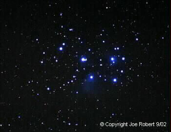 Pleiades at CSP-12 taken by Joe Roberts
The image was taken with a 500mm lens at F6.3
Kodak Royal Gold 400 film, three * 10 minute exposure.
