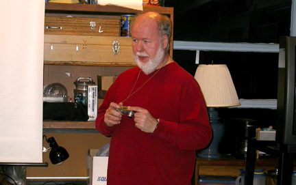 Photo by Ray Kaville
Winter Solstice party 12/13/08 - Leo Taylor getting some action shots during the dinner.

