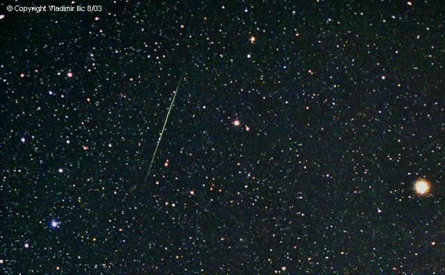 Sporadic meteor in Bootis taken by Vladimir Ilic
8/20/03 from Mohawk Mountain
Pentax ME Super, 50mm F2.8 Lens, CG-5, Kodak HD400, 15 min
