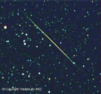 Sporadic meteor taken by Vladimir Ilic
Taken 8/13/02 from Mohawk Mountain
Vivitar 3800N 28mm F1.7, stationary
Kodak 800 Max 10 min with Barn Door Tracker
