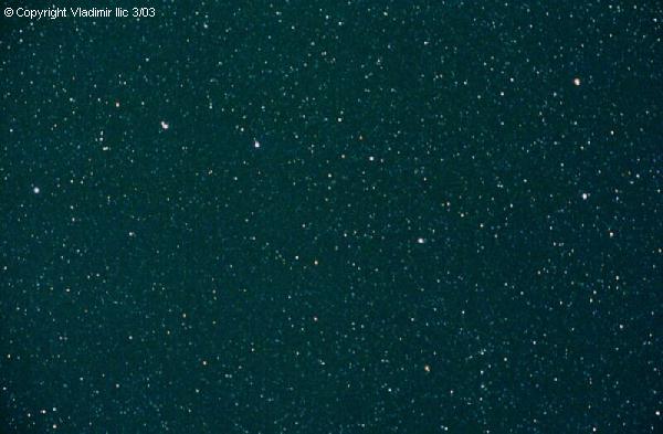 Big Dipper section of Ursa Major by Vladimir Ilic
Taken 3/23/03 from Amenia New York with film Vivitar 3800N
50mm F2.8, CG5 mount, Kodak Gold 400, 10 min
