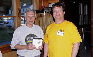 Photo by Alan Chaniewski
Member Andy Poniros gets lucky in winning a video capture device at the CSP 22 raffle. Presenting is Presidet Greg Barker.
