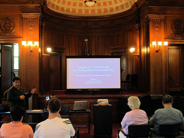 Greg Barker Speaks to Blackstone Library about loaning out telescope.
Photo by Laurie Averill.

ASNH loans a telescope to Library which signs it out to townspeople.

